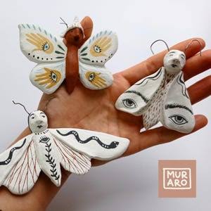 Moth Under Moon Figure
